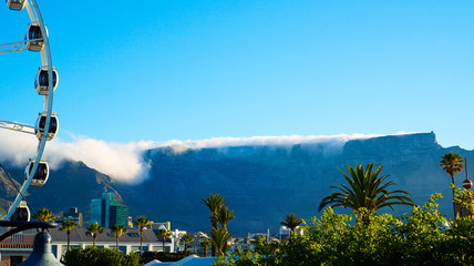 Table mountain with cloth view from VA watefront at ferris wheel iconic landscape of Cape Town...