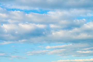 Naklejka premium Idylic blue sky with fluffy cloud sunset