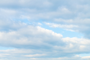 Idylic blue sky with fluffy cloud sunset