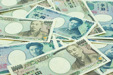 pile of many type japan banknotes,  yen currency. the currency which Influence on the world economy. money game powers. economy and funds concept.