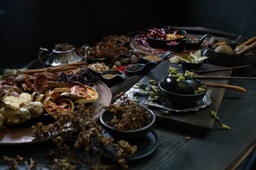 A variety spices and herbs in wooden bowls,  Of Asians For cooking.