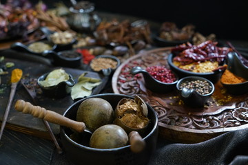 A variety spices and herbs in wooden bowls,  Of Asians For cooking.