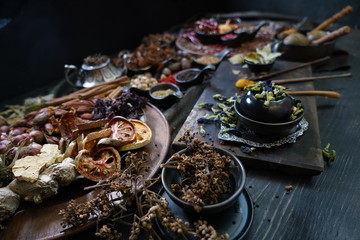 A variety spices and herbs in wooden bowls,  Of Asians For cooking.