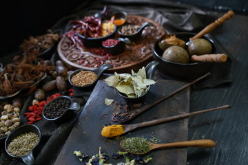 A variety spices and herbs in wooden bowls,  Of Asians For cooking.