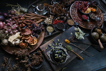 A variety spices and herbs in wooden bowls,  Of Asians For cooking.