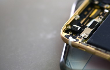 Close-up photos showing process of mobile phone repair 