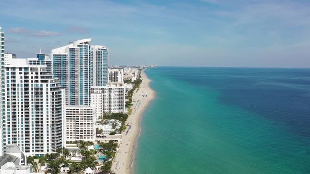 Aerial 4k footage of buildings on the beach in Miami Beach