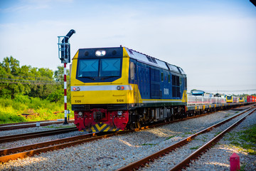 High Speed Electric train. Cargo train platform with freight train container at depot in port use for export logistics background. Passenger diesel train traveling speed railway wagons journey light
