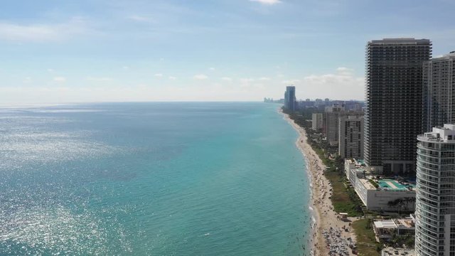 Aerial 4k footage of buildings on the beach in Miami Beach