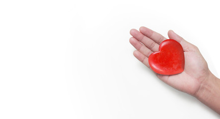 Hands holding a red heart .health donation concepts