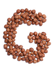Letter G of the English alphabet from from hazelnut on a white isolated background. Food pattern made from nuts. Bright alphabet for shops.