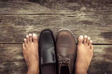 The decision between boots or leather shoes.