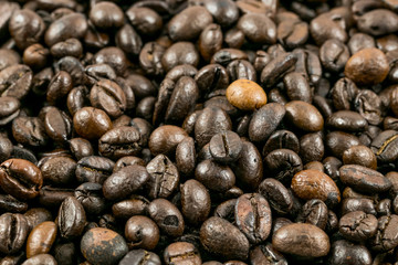 roasted coffee beans, can be used as a background.Mixture of different kinds of coffee beans. Coffee Background.