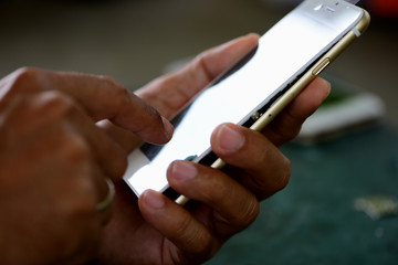 Close-up photos showing process of mobile phone repair 