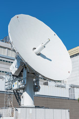 Satellite Communication Dish on top of TV Station