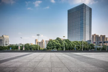 Foto op Canvas modern skyscrapers in modern city © evening_tao