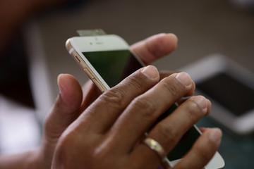 Close-up photos showing process of mobile phone repair 