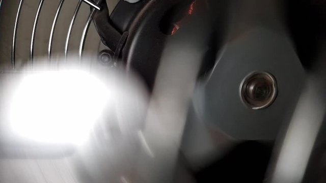 Slow motion industrial metal fan blades spinning, steampunk mechanical theme