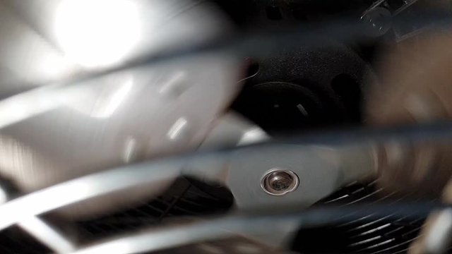 Slow motion industrial metal fan blades spinning, steampunk mechanical theme