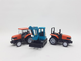 Fototapeta premium Photo Realistic Heavy Machinery Tractor Excavator Miniature Die Cast Toys Design for Souvenir Gift Collection Items in White Isolated Background 