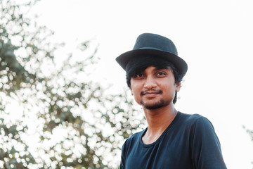 Portrait of an Indian male model wearing hat