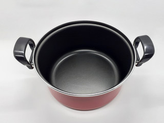 Elegant Luxury Modern Anti Sticky Silver Metallic Red and Black Colored Boiling Pan with Transparent Glass Cover Lid for Kitchen Cooking Appliances in White Isolated Background