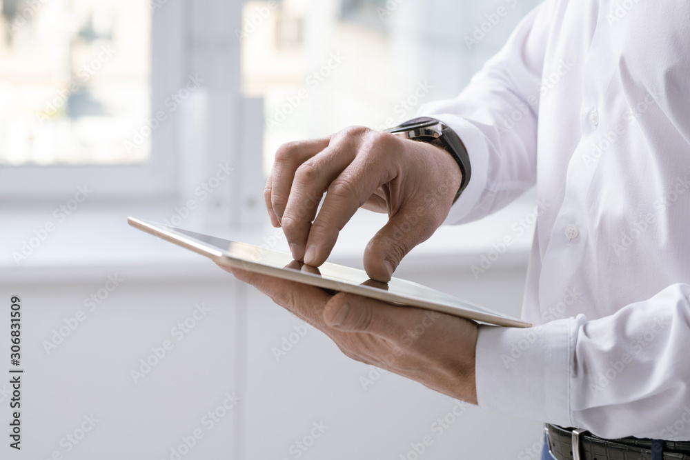 Poster hands of businessman with digital tablet over touchscreen preparing presentation