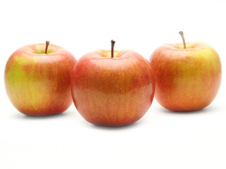 Ripe apples on a white background