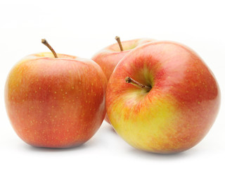 Ripe apples on a white background