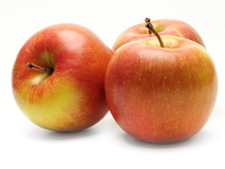 Ripe apples on a white background