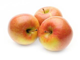 Ripe apples on a white background