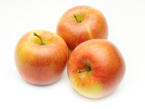 Ripe apples on a white background