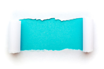 A hole in white paper with torn edges isolated on a white background with a light blue color paper background inside. Good paper texture