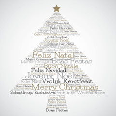 Christmas tree made from "Merry Christmas" in different languages in vector format.
