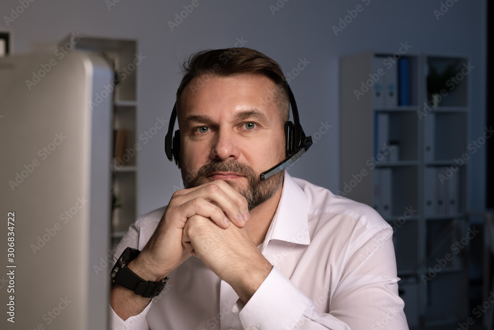 Poster Telephone operator looking at you while sitting in front of computer screen
