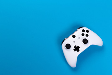 White joystick gamepad, game console isolated on white background. Computer gaming technology play competition videogame control confrontation concept. Cyberspace symbol - obrazy, fototapety, plakaty