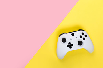 White joystick gamepad, game console isolated on white background. Computer gaming technology play competition videogame control confrontation concept. Cyberspace symbol