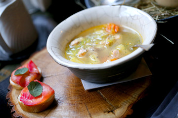 Photo macro fish soup and fish sandwiches