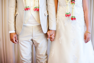 Man and woman holding hands in wedding ceremony . holding hand in wedding ceremony.