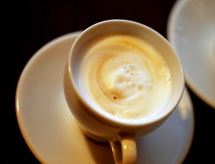 Photo macro delicious coffee with milk