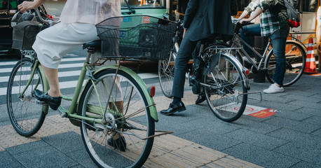 Fototapeta na wymiar Bicycle parked on the sidewalk, Japan classic bicycle parking