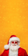fashionable Santa in round glasses