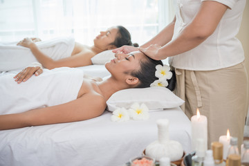 Fototapeta premium young woman getting spa treatment at beauty salon. spa face massage. facial beauty treatment. spa salon.