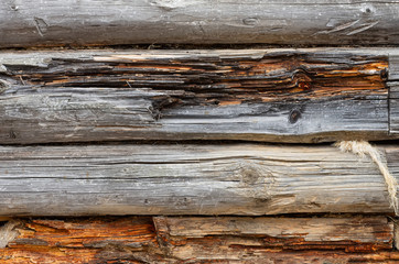 Old log wall. Texture of the wooden wall of an old house.