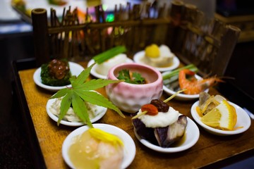 Authentic Japanese dishes served with floral garnish.