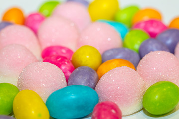 Background multi-colored sweets close-up. A lot of bright candy