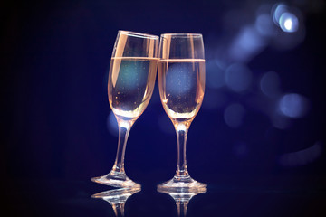 Two champagne glasses ready to bring in the New Year