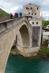 Fototapeta na wymiar Old bridge above the Neretva River in Mostar, Bosnia and Hercegovina