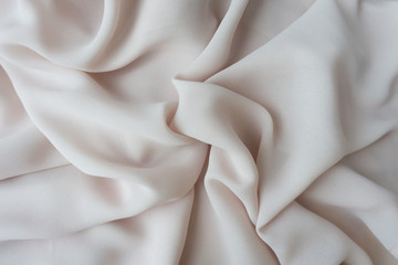 Smooth elegant pink textile . Silk, satin.