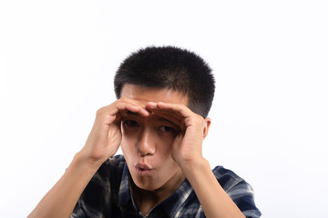 Closeup portrait of young handsome man face expressing astonishment and admiration in studio on...